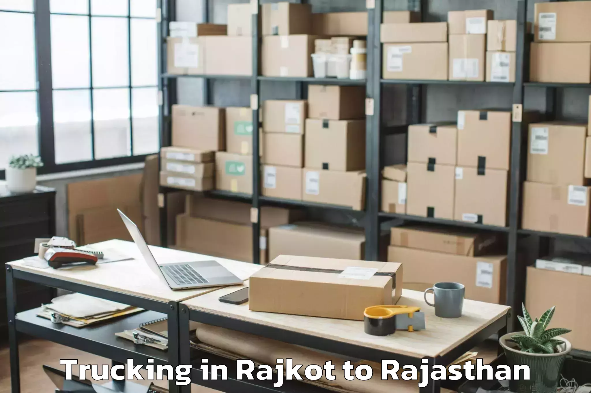 Expert Rajkot to Abhilashi University Jodhpur Trucking